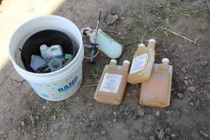 lot 864 image: Lawn Care Supplies  with Quali-Pro Propiconazole 14.3 Fungicide Plastic Bottles, Arborjet Sprayer, Misc. Products