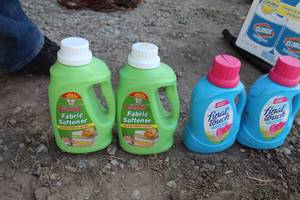 lot 869 image: Lot of (4) Fabric Softener Plastic Bottle