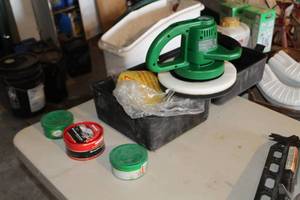 lot 889 image: Turtle Wax Buffer (new in box)  with Case and Polishing CompoundWax (3 cans)