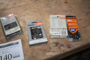 lot 1140 image: Lot of (17) Chain Saw Chains (new)  with Tool Box