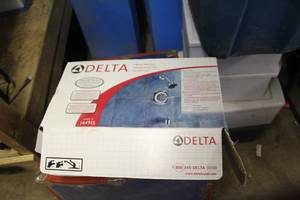 lot 1168 image: Delta Shower Parts (in box)