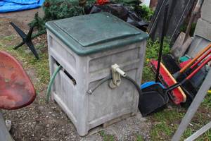 lot 1133 image: Garden Hose Station 21Lx21Wx28H  with Garden Hose and Accessories