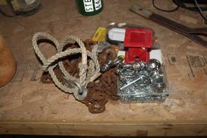 lot 1175 image: Lot of Trailer Accessories  with 2 Ball (new), 50 Chain, Couplings and Pins, Chain, Rope, Light