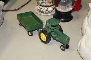 lot 1873 image: Metal Collectible Tractor with Trailer