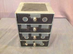 lot 19 image: Storage Container Full of Radio Parts
