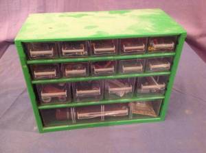 lot 57 image: Storage Container Full of Radio Parts