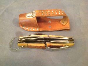 lot 76 image: Large Multi-Function Knife