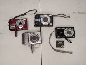 lot 612 image: (4) Point & Shoot Digital Cameras Nikon, Canon, Lumix