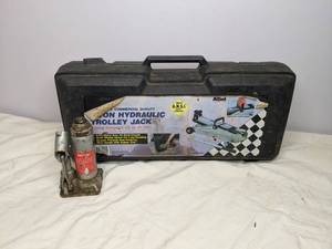 lot 669 image: (2) Car Jacks Hydraulic and Bottle