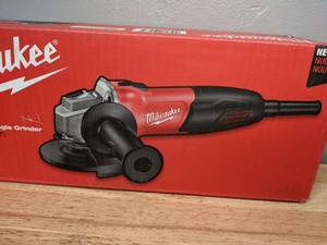 lot 4 image: Brand New Milwaukee 7 Amp Corded 4-12 in. Small Angle Grinder with Sliding Lock-On Switch