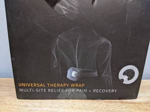 lot 18 image: Brand New Intellinetix Vibrating Universal Therapy Relief Wrap