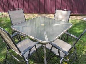 PATIO TABLE WITH 4 FOLDING CHAIRS