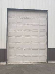 10 x 13 Garage Door in Sandstone with Spring &  tracks - Complete unit.