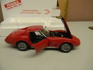 THE DANBURY MINT LIMITED EDITION 124 SCALE 1974 CHEVROLET CORVETTE COUPE - IN BOX - GREAT PIECE - SEE PICTURES