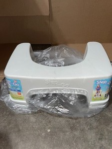 STEP AND GO 7 IN. TOILET POTTY AID IN WHITE. SEE PICTURES