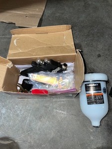 HUSKY GRAVITY FEED COMPOSITE HVLP SPRAY GUN. SEE PICTURES