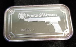 5 TROY OZ. .999 FINE SILVER BAR SMITH & WESSON SET IN AIRTITES
