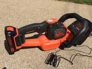 lot 59 image: Black and Decker 22 inch 20 Volt Lithium  Rechargeable Hedge Trimmer