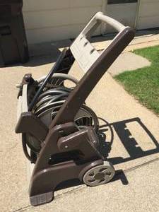 lot 70 image: Ames Garden Hose Rolling Reel and Hose