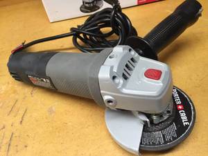 lot 80 image: Porter Cable 6 Amp 4.25 Inch Angle Grinder