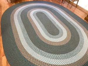 lot 6 image: Large Braided Area Rug in Hues of Blue