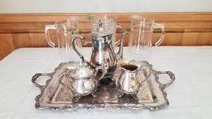 International Silver Tea Service with Glass Pitchers