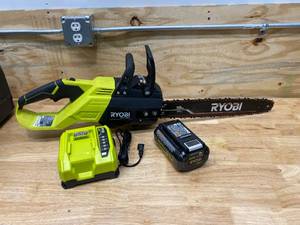 lot 71 image: RYOBI 18 in. HP 40V Brushless Lithium-Ion Electric Cordless Battery Chainsaw - 5.0 Ah Battery, Charger and Carrying Case Included