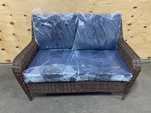 lot 96 image: HAMPTON BAY Cambridge Brown Wicker Outdoor Patio Loveseat with CushionGuard Midnight Navy Blue Cushions