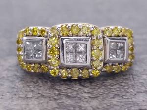 lot 22 image: Yellow and White Diamond Halo Ring in 14k Gold $3,450 Retail
