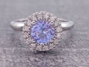 lot 47 image: Brand New Natural Tanzanite and Diamond Halo Ring in 14k Gold $1,825 Retail