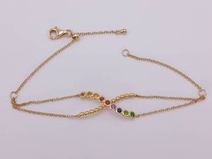 lot 77 image: Double Strand Criss-Cross Sapphire and Semi-Precious Multi-Color Bracelet in 18k Gold $1025 Retail