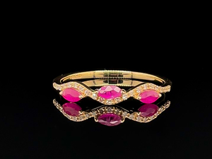 lot 57 image: Natural Ruby and Diamond Wave Band Ring in 14k Gold $1,460 Retail
