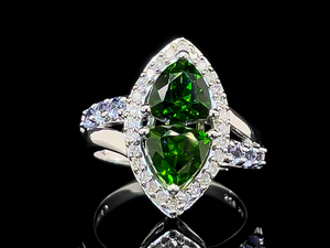lot 93 image: Double Trillion Cut Chromium Diopside and Diamond Halo Ring
