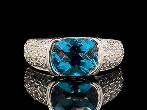 lot 99 image: Checkerboard Cut Iolite and White Sapphire Ring