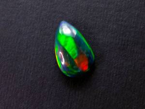 lot 40C image: Insane 1.38 Carat Natural Bright Black Ethiopian Opal