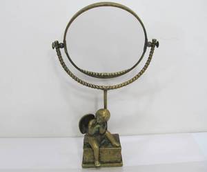 lot 275 image: Vintage Heavy Brass Figural Vanity Mirror wCherub