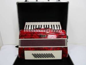 lot 279 image: Excellent Working Red IOLITE Accordion wCase 