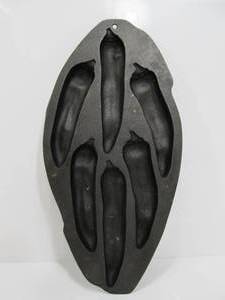 lot 260 image: LODGE Cast Iron Chili Pepper Cornbread Pan
