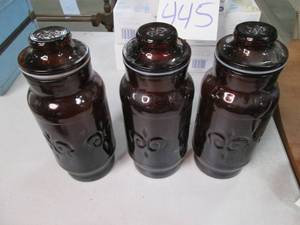 lot 447 image: Lot of 3 Amber Colored Lidded Jars ...