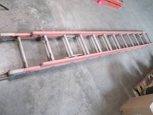 lot 493 image: 24 foot Metal Extension Ladder...