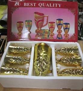 lot 517 image: Best Quality 7PC CupGoblet & Pitcher Set. Solid-Color with Ornate, Gold Tone Trim & Accents