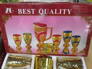 lot 519 image: Best Quality 7PC CupGoblet & Pitcher Set. Solid-Color with Ornate, Gold Tone Trim & Accents