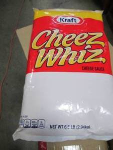 lot 548 image: (1) Kraft Cheez Whiz Cheese Sauce (6.5LBPackage)