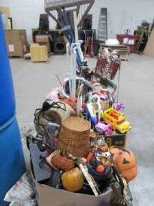 lot 555 image: Massive Holiday and Home Dcor Lot FILLED with some adorable items Kids toys, Christmas & Halloween nik-naks galore, pet beds, curtain rods, tv trays, styrofoam coolerthe list goes