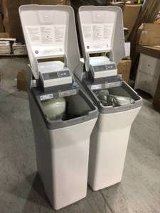 Lot of 2 GE Water Softners not used damaged covers see pictures