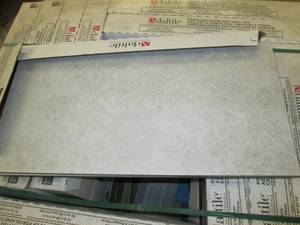 lot 22 image: 12 cases of daltile porcelain floor...