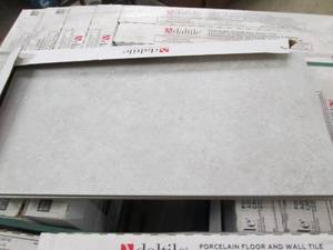 lot 23 image: 12 cases of daltile porcelain floor...