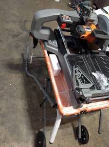 15 Amp 10 in. Dual Bevel Miter Saw with LED Cut Line Indicator by RIDGID Customer Returns See Pictures