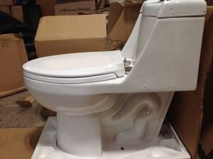 Fenwick 1-Piece 1.6 GPF1.1 GPF Dual Flush Elongated Toilet in White by Glacier Bay Customer Returns See Pictures