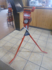lot 7 image: First Pitch Relief Pitcher Junior Pitching Machine